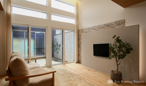 庭と一体に楽しむ開放的なリビングのあるガレージハウス